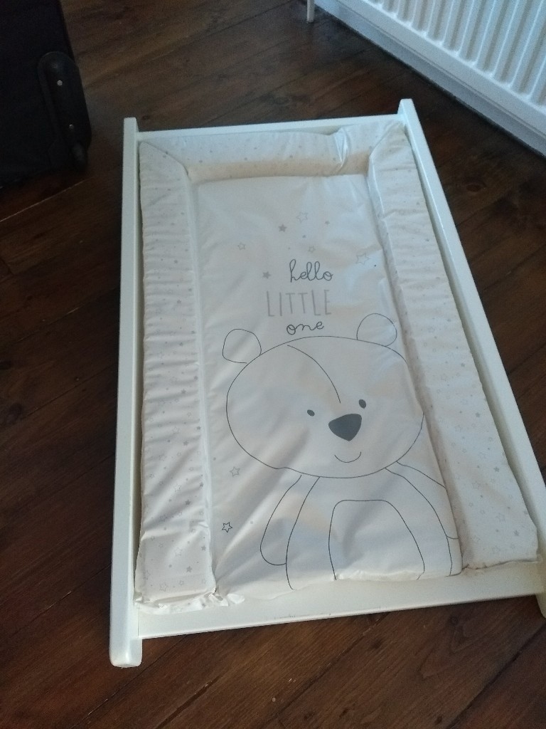 changing board over cot
